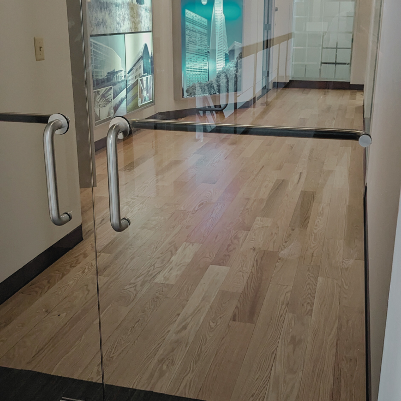 Real Solid Wood floors over raised panel, steel subfloors in commercial office