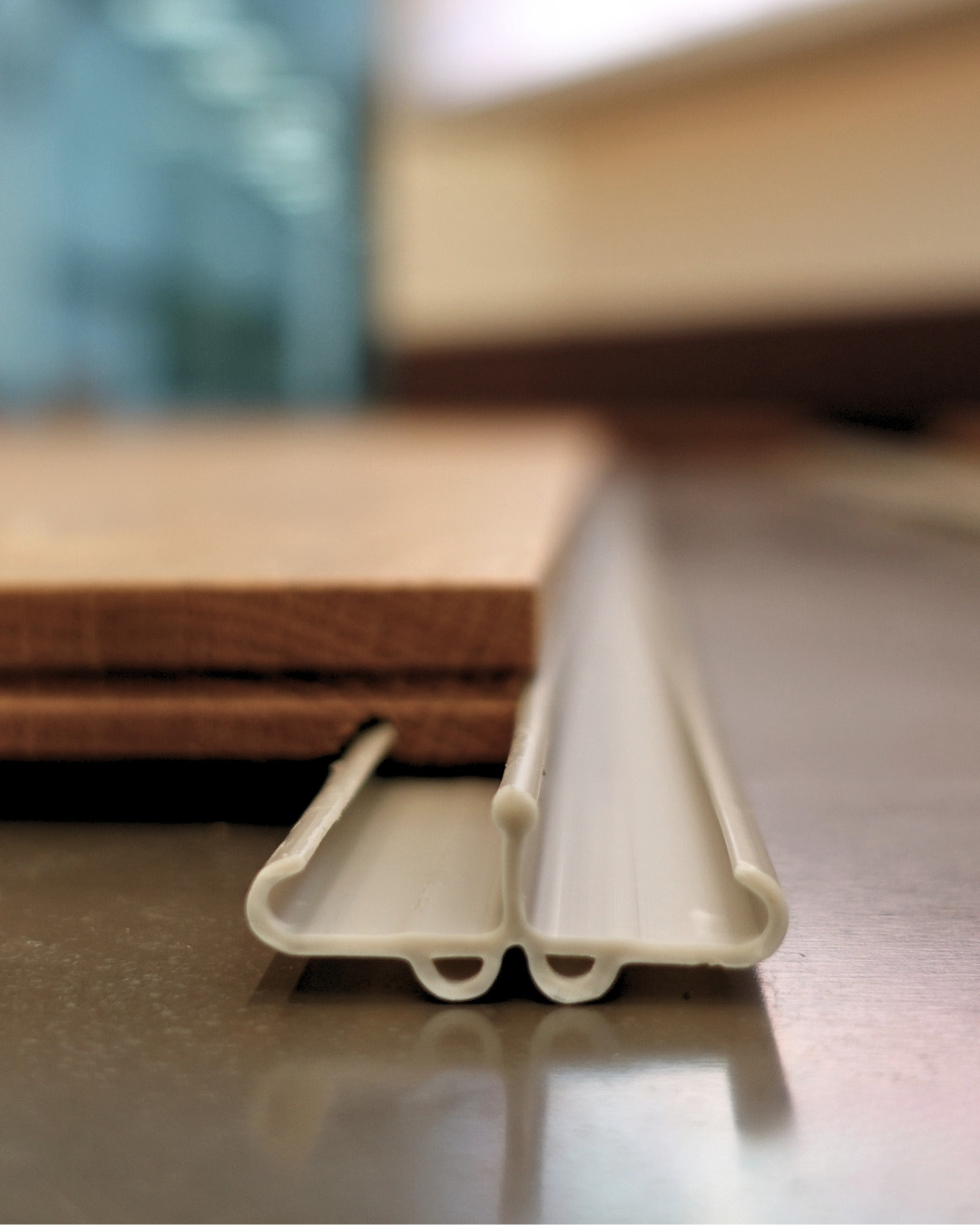 33" assembly system clips for flooring installation, pack of 25 or 125, close-up view.