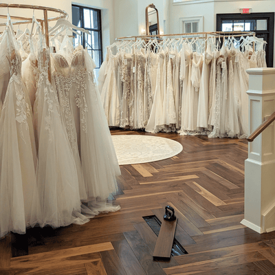 Luxury Retail by Steller Floors in Solid Walnut Herringbone