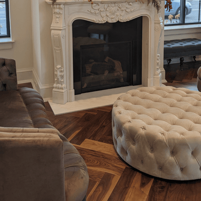Luxury Retail by Steller Floors in Solid Walnut Herringbone- Fireplace and Furniture