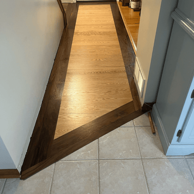 Steller Floating Solid Wood Floors in DIY Renovations - Tahoe Walnut Picture Frame Border with American Oak Tacoma - Craftsmanship