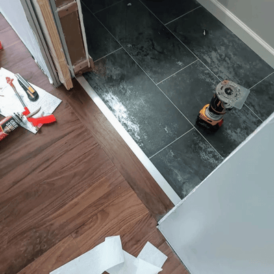 Steller Floating Solid Wood Floors in DIY Renovations - Linear Lay Tahoe Walnut Lakehouse Transition